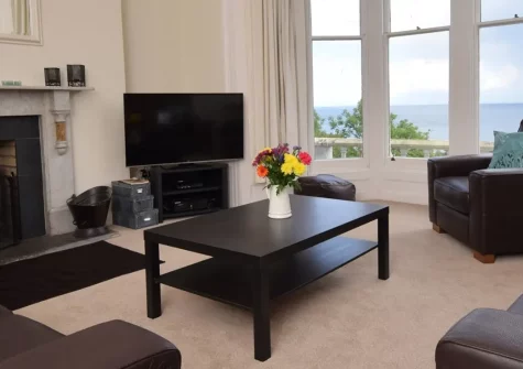 Oceans Edge, Ilfracombe is a sophisticated two-bedroom retreat with stunning sea views from its elevated position. Enjoy stylish interiors, a private balcony & easy access to local attractions. Perfect for families seeking a luxurious coastal escape.