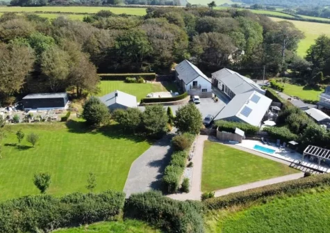 Ochre is a contemporary holiday home with shared plunge pool, patio, outdoor space & relaxation area