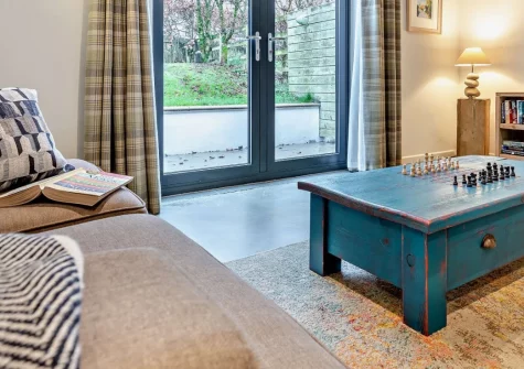 Ochre, West Putford is a contemporary two-bedroom cottage in peaceful North Devon countryside, featuring a shared plunge pool, wood burner, private patio with barbecue, and on-site art lessons, close to spectacular coastal walks and beaches.