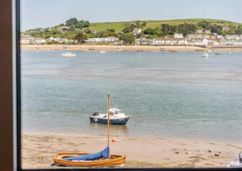 Enjoy uninterrupted estuary views across to Instow & beyond from the living & dining area at Old Brewhouse 2, Appledore