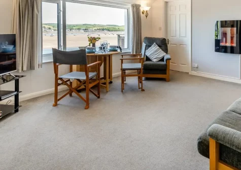 Old Brewhouse 2, Appledore is a sophisticated waterfront apartment with uninterrupted estuary views, private enclosed balcony, and two double bedrooms. Perfect for couples seeking maritime charm, coastal adventures, and peaceful relaxation.