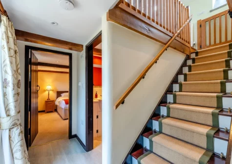 The stairs down from the first floor at Old Dairy Barn, Challacombe