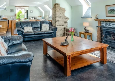 Old Dairy Barn, Challacombe is a charming 2-bedroom stone conversion on working Exmoor farmland. Enjoy hot tub relaxation, stunning farmland views, and easy access to golden beaches, wild moors, and family attractions for truly memorable holidays.
