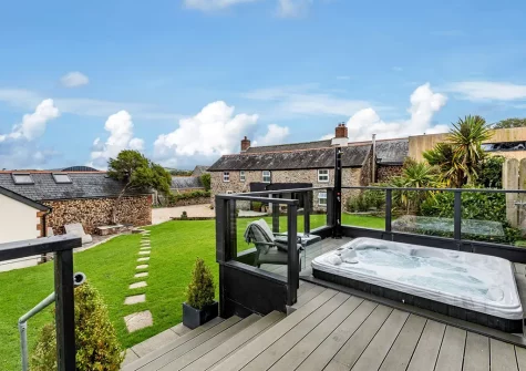 The decked terrace & hot tub at Old Farmhouse, Week Orchard