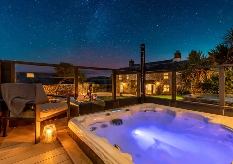 The decked terrace & hot tub at Old Farmhouse, Week Orchard