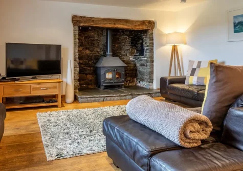 Old Farmhouse, Week Orchard is a beautiful six-bedroom country haven mixing historic character with modern luxuries. Enjoy a games room, sunken hot tub, sauna, & children's play area while being perfectly positioned to explore Cornwall's attractions.