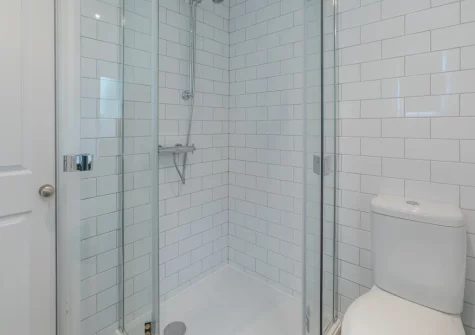 Bedroom #1 en-suite shower room at Old Post Office, Golant