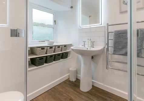 Bedroom #1 en-suite shower room at Old Post Office, Golant