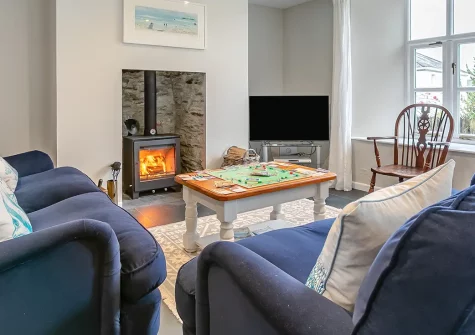 Old Post Office, Golant is a stunning riverside retreat perfect for families seeking Cornish charm. With three bedrooms, river views, and a welcoming wood burner, this dog-friendly home offers cosy comfort and easy access to beautiful beaches.