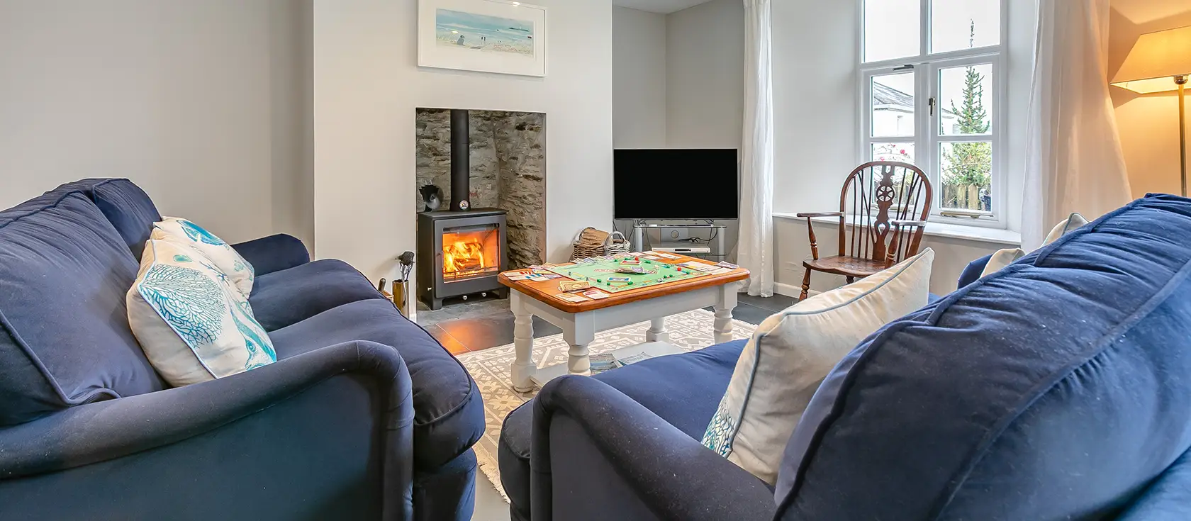Old Post Office, Golant is a stunning riverside retreat perfect for families seeking Cornish charm. With three bedrooms, river views, and a welcoming wood burner, this dog-friendly home offers cosy comfort and easy access to beautiful beaches.