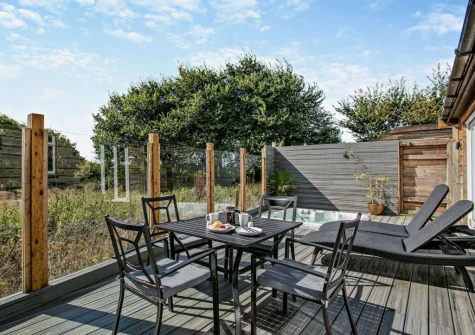 The enclosed decked terrace, barbecue & alfresco dining area at Old Spot, Westward Ho!