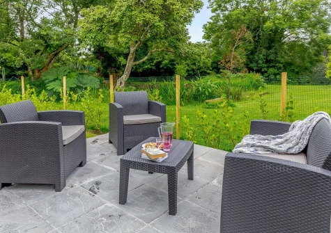 The patio & outdoor sitting area at Olive Cottage, Penryn