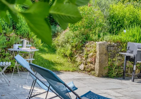 The patio, barbecue & outdoor sitting area at Olive Tree, St Teath