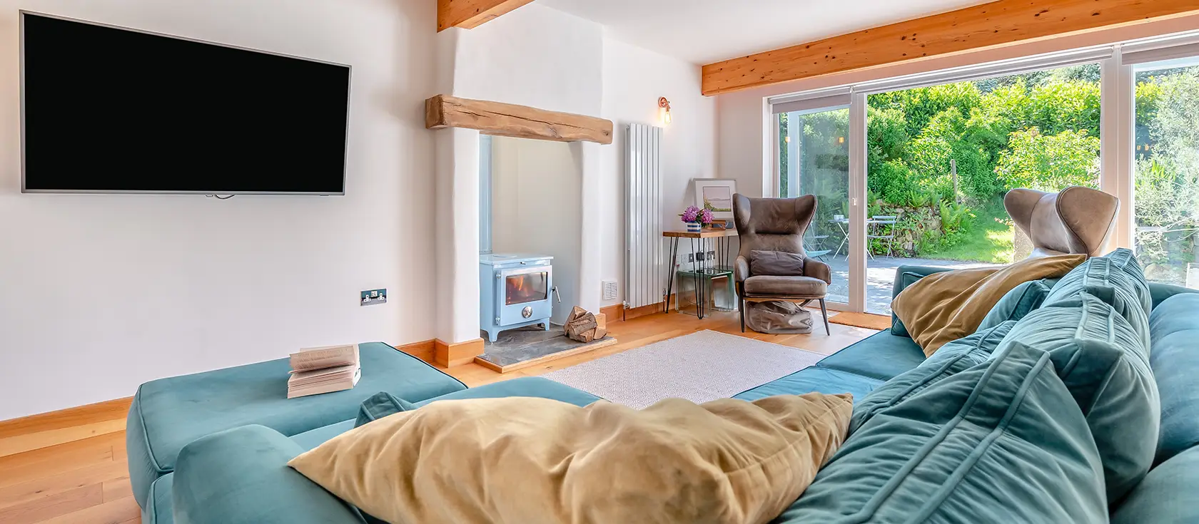 Olive Tree, St Teath is a luxurious single-storey cottage for six guests, featuring a bespoke kitchen, cocktail bar, and enclosed patio with BBQ. Perfectly positioned to explore Cornwall's dramatic coastline and legendary attractions.