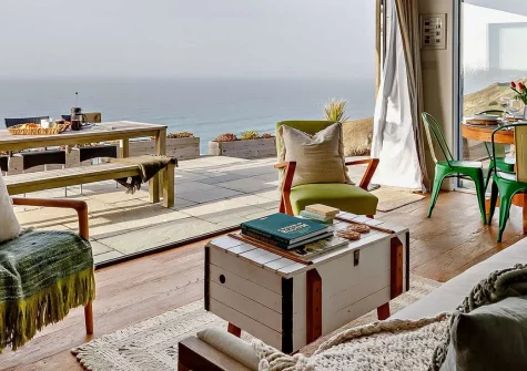 Omega, Freathy is a stunning clifftop lodge with breathtaking sea views and a private hot tub. Enjoy stylish interiors, bi-folding doors, golden beaches on your doorstep, and access to Cornwall's dramatic Rame Peninsula. Perfect for romantic escapes.