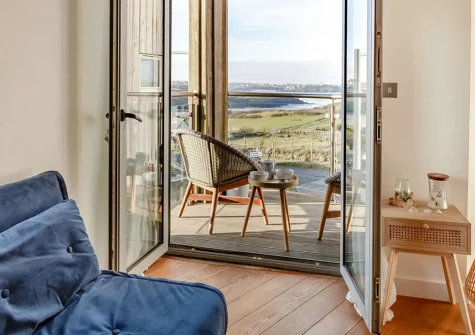 Once upon a Tide, Newquay is a stylish two-bedroom seafront apartment with stunning ocean views. Positioned for beach lovers, wake to the sound of waves and explore hidden coves, charming villages, and family attractions. The perfect coastal escape.