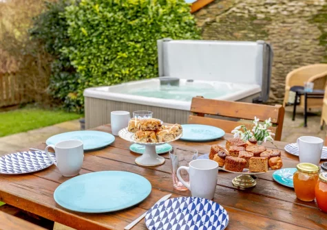 The patio, barbecue & alfresco dining area at Oriel Cottage, Muddiford