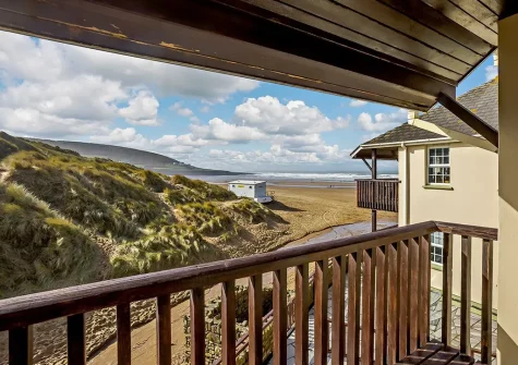 The balcony & outdoor sitting area at Orleigh, Croyde Bay