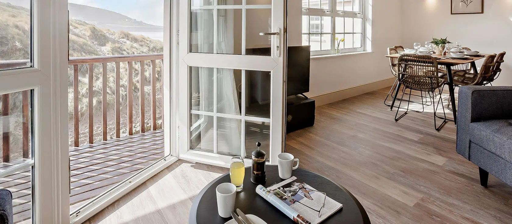 Orleigh, Croyde Bay is a recently refurbished 3-bedroom beachside apartment with a private balcony and direct beach access. It's perfect for families seeking surfing adventures, coastal relaxation, and unforgettable holiday memories in North Devon.