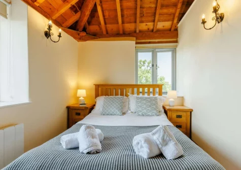 Bedroom #1 at Otter Barn Lakes, St Giles-on-the-Heath