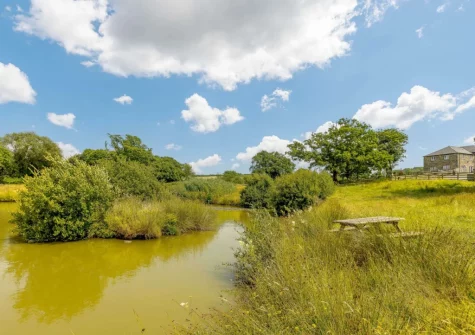 Enjoy access to seven acres of private grounds with two lakes stocked with carp when you stay at Otter Barn Lakes, St Giles-on-the-Heath