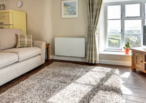 Otterbridge at Penrose Burden, St Breward is a peaceful two-bedroom barn conversion on the edge of Bodmin Moor, featuring countryside views across the Camel Valley, characterful beamed interiors, and perfect access to the Camel Trail and coast.