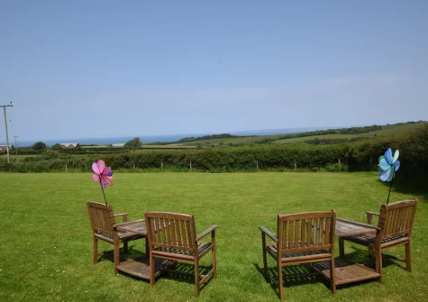 The garden & outdoor sitting area at Owl Barn at The Retreat, Higher Clovelly