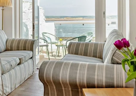 Paddles, Appledore is a characterful 3-bedroom cottage with stunning sea views from bedrooms and kitchen. Enjoy coastal village charm, enclosed patio dining, and easy access to North Devon's beaches and attractions for memorable escapes.