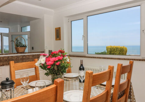 The dining area at Panoramic Cottage, Brixham