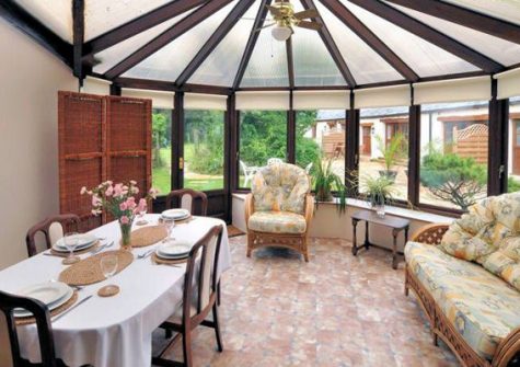 The dining area in the conservatory @ Park Mill Farm Cottage
