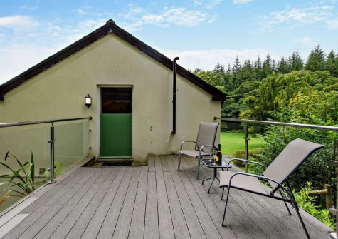 The decked terrace & outdoor sitting area at Parr Cottage, Two Waters Foot