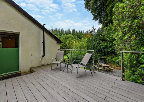 The decked terrace & outdoor sitting area at Parr Cottage, Two Waters Foot