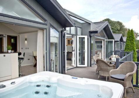 The hot tub & wrap-around deck at Parracombe Lodge, Kentisbury Grange, Kentisbury