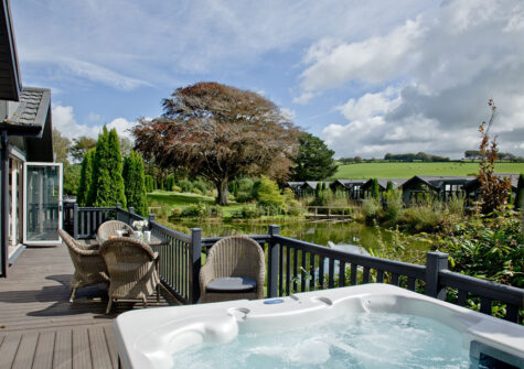 The hot tub & wrap-around deck at Parracombe Lodge, Kentisbury Grange, Kentisbury