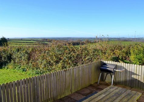The patio & barbecue area at Parsley Cottage, Clawton
