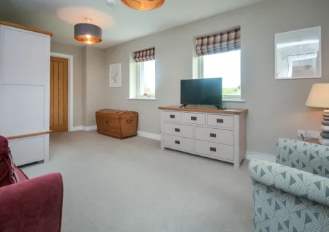 The small ground floor lounge at Peacehay Barn, Little Petherick