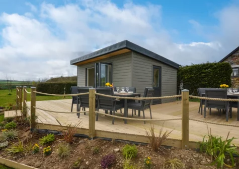 The decked patio & alfresco dining area at Peacehay Barn, Little Petherick