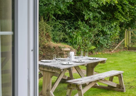 The alfresco dining area & garden at Peal Cottage, Two Waters Foot