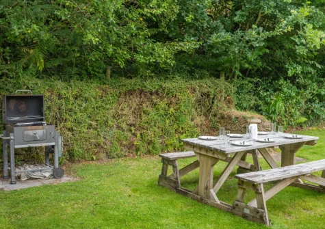 The barbecue, alfresco dining area & garden at Peal Cottage, Two Waters Foot