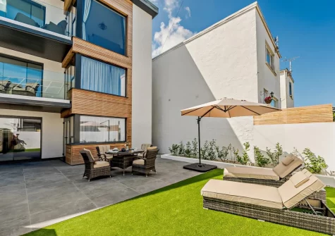 The patio, alfresco dining area & garden at Pebble Bay, Westward Ho!