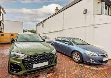 Pebble Bay has private parking for two cars at the rear of the property