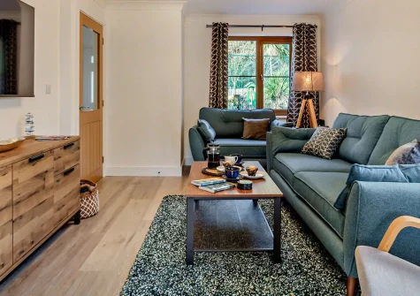 Pebbles, Portreath is a stylish four-bedroom cottage just 500m from sandy beaches and local amenities. Enjoy a beautifully landscaped garden, dedicated games room, and direct coastal path access for the perfect Cornish family retreat experience.