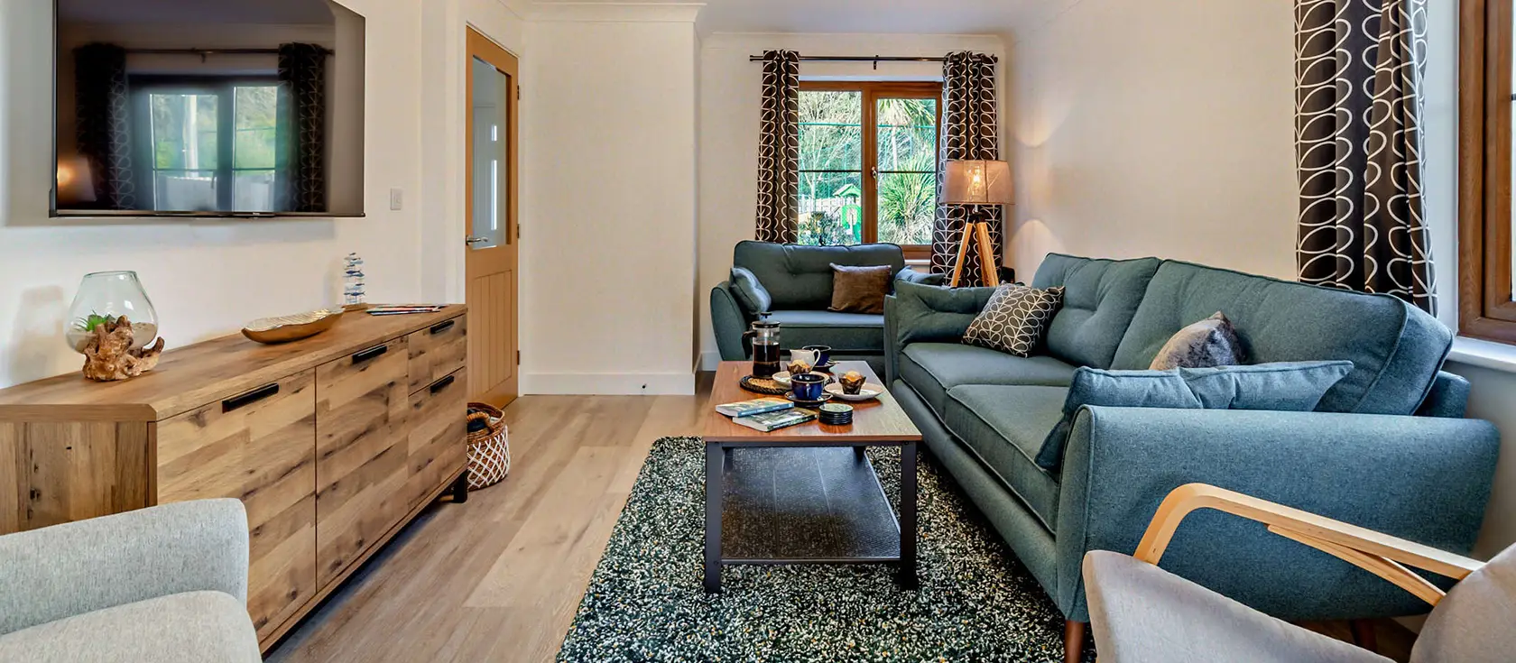 Pebbles, Portreath is a stylish four-bedroom cottage just 500m from sandy beaches and local amenities. Enjoy a beautifully landscaped garden, dedicated games room, and direct coastal path access for the perfect Cornish family retreat experience.