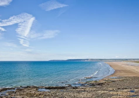 The beach & sea view from the balcony & outdoor sitting area at Pebbles, Westward Ho!