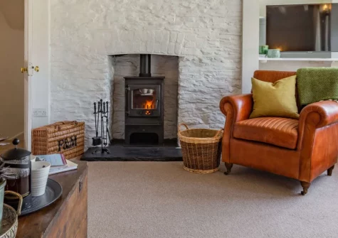 Peep O Day, West Buckland is a Grade II-listed thatched cottage in a quiet South Devon hamlet, featuring characterful period details, a cosy wood burner, traditional cottage gardens, and easy access to Bantham Beach and coastal walks.