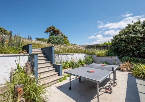The rear patio & tiered garden at Pen Y Mor, Mawgan Porth