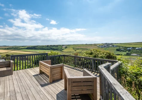 The front decked patio & outdoor sitting area at Pen Y Mor, Mawgan Porth