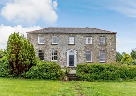 Pendavey Farm House is a stunning Georgian farmhouse with extensive private gardens and countryside & estuary views