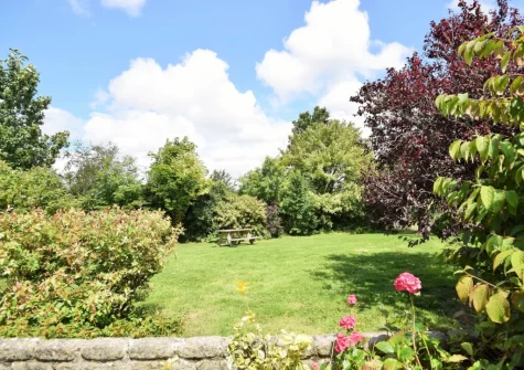 The large lawned cottage garden at Pendavey Lodge, Sladesbridge