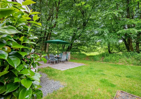 The patio, alfresco dining area & garden at Pendowr Lodge, Davidstow